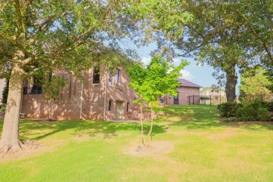 This stunning all-brick home, has been completely remodeled to on RidgePointe Country Club in Arkansas - for sale on GolfHomes.com, golf home, golf lot