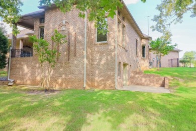 This stunning all-brick home, has been completely remodeled to on RidgePointe Country Club in Arkansas - for sale on GolfHomes.com, golf home, golf lot