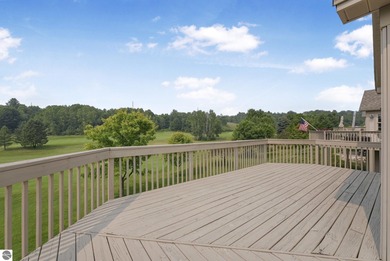 Enjoy low-maintenance living with beautiful golf course views in on Crown Golf Course in Michigan - for sale on GolfHomes.com, golf home, golf lot