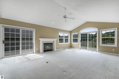 Enjoy low-maintenance living with beautiful golf course views in on Crown Golf Course in Michigan - for sale on GolfHomes.com, golf home, golf lot