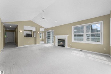 Enjoy low-maintenance living with beautiful golf course views in on Crown Golf Course in Michigan - for sale on GolfHomes.com, golf home, golf lot