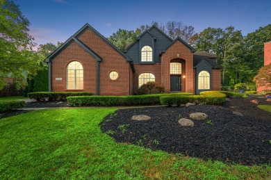 Discover unparalleled elegance in this brick colonial nestled on Beacon Hill Golf Club in Michigan - for sale on GolfHomes.com, golf home, golf lot
