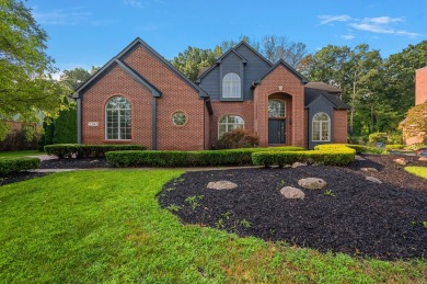Discover unparalleled elegance in this brick colonial nestled on Beacon Hill Golf Club in Michigan - for sale on GolfHomes.com, golf home, golf lot