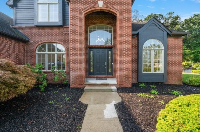 Discover unparalleled elegance in this brick colonial nestled on Beacon Hill Golf Club in Michigan - for sale on GolfHomes.com, golf home, golf lot