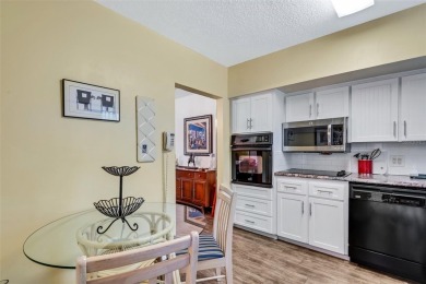 Prepare to be captivated! This 2 bed/2 bath gem is fully on On Top Of The World Golf Course in Florida - for sale on GolfHomes.com, golf home, golf lot