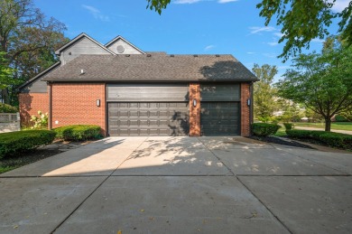 Discover unparalleled elegance in this brick colonial nestled on Beacon Hill Golf Club in Michigan - for sale on GolfHomes.com, golf home, golf lot