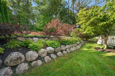 Discover unparalleled elegance in this brick colonial nestled on Beacon Hill Golf Club in Michigan - for sale on GolfHomes.com, golf home, golf lot