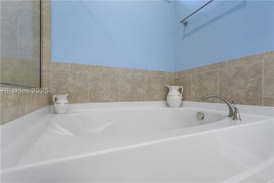 Enjoy captivating water-to-golf views from this stunning 3BR/2BA on Argent Lakes Golf Course in South Carolina - for sale on GolfHomes.com, golf home, golf lot