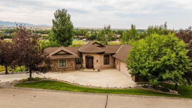 Discover luxury living in this impeccable home located in the on The Powder Horn Golf Club - Mountain in Wyoming - for sale on GolfHomes.com, golf home, golf lot