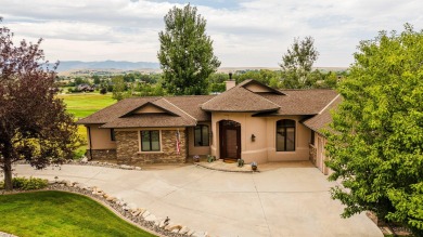 Discover luxury living in this impeccable home located in the on The Powder Horn Golf Club - Mountain in Wyoming - for sale on GolfHomes.com, golf home, golf lot