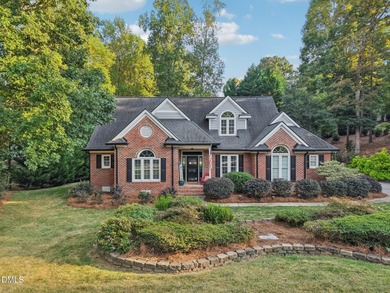 Welcome to Sunset Ridge! This charming 4-bedroom, 2.5-bath home on Devils Ridge Golf Club in North Carolina - for sale on GolfHomes.com, golf home, golf lot