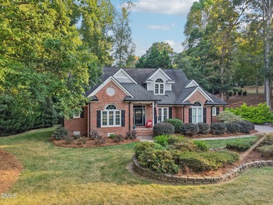 Welcome to Sunset Ridge! This charming 4-bedroom, 2.5-bath home on Devils Ridge Golf Club in North Carolina - for sale on GolfHomes.com, golf home, golf lot