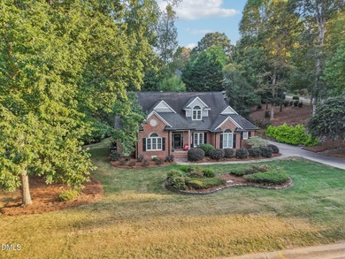 Welcome to Sunset Ridge! This charming 4-bedroom, 2.5-bath home on Devils Ridge Golf Club in North Carolina - for sale on GolfHomes.com, golf home, golf lot