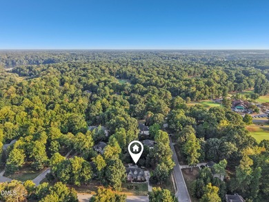 Welcome to Sunset Ridge! This charming 4-bedroom, 2.5-bath home on Devils Ridge Golf Club in North Carolina - for sale on GolfHomes.com, golf home, golf lot