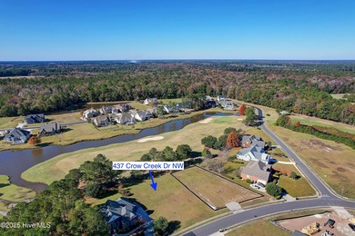 Welcome to coastal living at its finest in Crow Creek! This on Crow Creek Golf Club in North Carolina - for sale on GolfHomes.com, golf home, golf lot