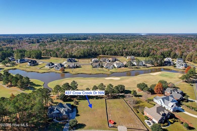 Welcome to coastal living at its finest in Crow Creek! This on Crow Creek Golf Club in North Carolina - for sale on GolfHomes.com, golf home, golf lot