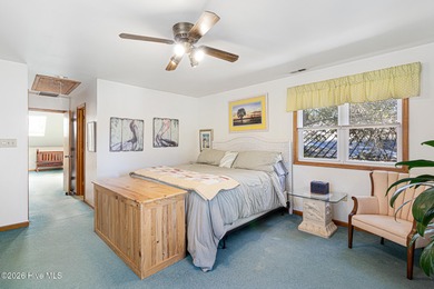 Canalfront 4-bedroom home situated on a private lot in Pine on The Country Club of the Crystal Coast in North Carolina - for sale on GolfHomes.com, golf home, golf lot