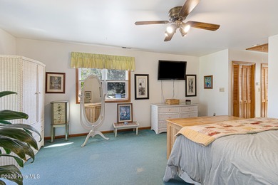 Canalfront 4-bedroom home situated on a private lot in Pine on The Country Club of the Crystal Coast in North Carolina - for sale on GolfHomes.com, golf home, golf lot