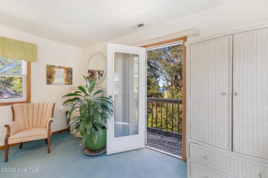 Canalfront 4-bedroom home situated on a private lot in Pine on The Country Club of the Crystal Coast in North Carolina - for sale on GolfHomes.com, golf home, golf lot