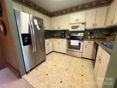 Single level living in Maggie Valley Country Club Estates, just on Maggie Valley Resort and Country Club in North Carolina - for sale on GolfHomes.com, golf home, golf lot