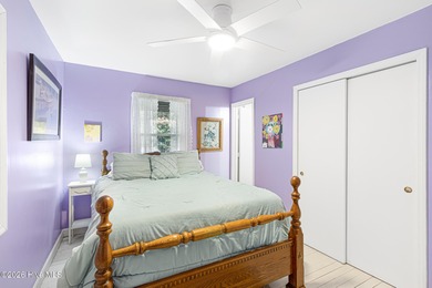 Canalfront 4-bedroom home situated on a private lot in Pine on The Country Club of the Crystal Coast in North Carolina - for sale on GolfHomes.com, golf home, golf lot