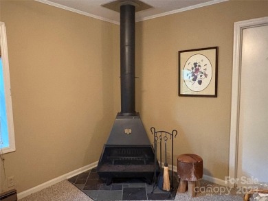 Single level living in Maggie Valley Country Club Estates, just on Maggie Valley Resort and Country Club in North Carolina - for sale on GolfHomes.com, golf home, golf lot