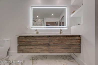 Fully Rebuilt Mountain Contemporary Townhome in Pinecrest Lake on Pinecrest Lake Golf and Country Club in Pennsylvania - for sale on GolfHomes.com, golf home, golf lot