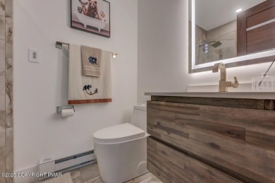 Fully Rebuilt Mountain Contemporary Townhome in Pinecrest Lake on Pinecrest Lake Golf and Country Club in Pennsylvania - for sale on GolfHomes.com, golf home, golf lot