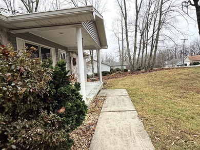 Nestled in the heart of Fairfield Glade, this charming home at on Druid Hills Golf Club in Tennessee - for sale on GolfHomes.com, golf home, golf lot
