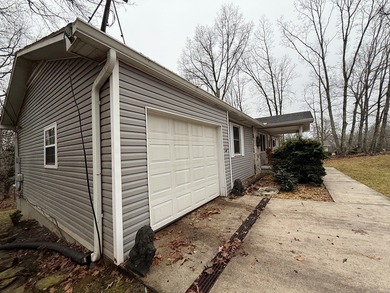 Nestled in the heart of Fairfield Glade, this charming home at on Druid Hills Golf Club in Tennessee - for sale on GolfHomes.com, golf home, golf lot