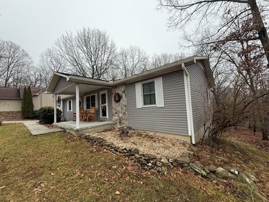 Nestled in the heart of Fairfield Glade, this charming home at on Druid Hills Golf Club in Tennessee - for sale on GolfHomes.com, golf home, golf lot