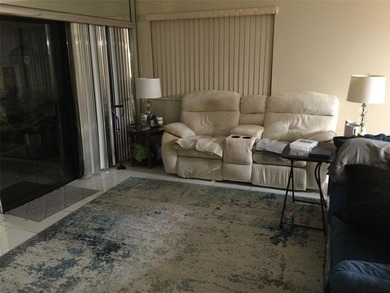 BEAUTIFUL SPACIOUS FIRST FLOOR GARDENS UNIT WITH FABULOUS VIEW on Pine Island Ridge Country Club in Florida - for sale on GolfHomes.com, golf home, golf lot