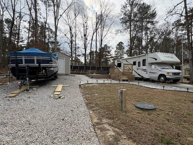 Camp lot for sale in the gated resort community of Lake Royale on River Golf and Country Club at Lake Royale in North Carolina - for sale on GolfHomes.com, golf home, golf lot