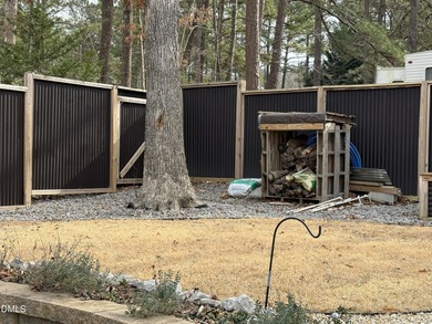 Camp lot for sale in the gated resort community of Lake Royale on River Golf and Country Club at Lake Royale in North Carolina - for sale on GolfHomes.com, golf home, golf lot