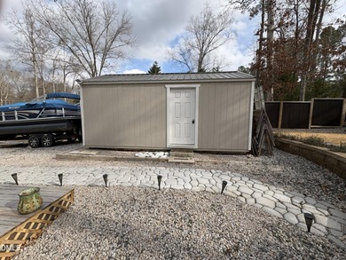 Camp lot for sale in the gated resort community of Lake Royale on River Golf and Country Club at Lake Royale in North Carolina - for sale on GolfHomes.com, golf home, golf lot