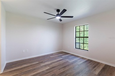 Welcome home to this beautifully updated 2-bedroom, 2-bath on Meadow Oaks Golf and Country Club in Florida - for sale on GolfHomes.com, golf home, golf lot