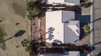 Come see this 3-bedroom, 2-bath home located right on the golf on Desert Lakes Golf Course in Arizona - for sale on GolfHomes.com, golf home, golf lot