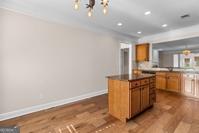 Beautifully maintained single-family home located in Sun City on Canongate Golf At Sun City Peachtree in Georgia - for sale on GolfHomes.com, golf home, golf lot