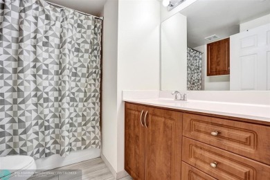 Welcome to this updated condo in Emerald Dunes, West Palm Beach on Emerald Dunes Golf Club in Florida - for sale on GolfHomes.com, golf home, golf lot