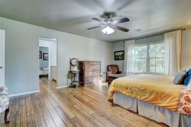 This charming two story Tudor style home boasts 5 bedrooms, 4 on Elks Country Club in Oklahoma - for sale on GolfHomes.com, golf home, golf lot