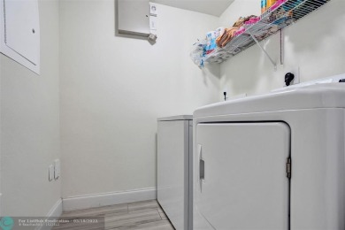 Welcome to this updated condo in Emerald Dunes, West Palm Beach on Emerald Dunes Golf Club in Florida - for sale on GolfHomes.com, golf home, golf lot