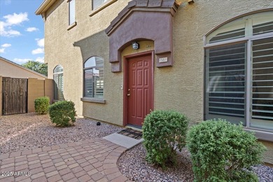 Move-in ready and beautifully updated! This end-unit townhome in on Augusta Ranch Golf Club in Arizona - for sale on GolfHomes.com, golf home, golf lot