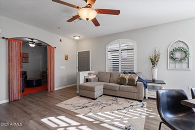 Move-in ready and beautifully updated! This end-unit townhome in on Augusta Ranch Golf Club in Arizona - for sale on GolfHomes.com, golf home, golf lot