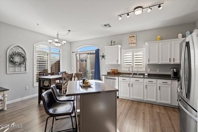 Move-in ready and beautifully updated! This end-unit townhome in on Augusta Ranch Golf Club in Arizona - for sale on GolfHomes.com, golf home, golf lot