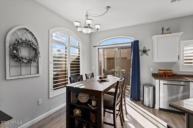 Move-in ready and beautifully updated! This end-unit townhome in on Augusta Ranch Golf Club in Arizona - for sale on GolfHomes.com, golf home, golf lot