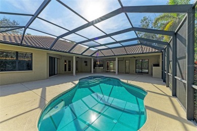 One or more photo(s) has been virtually staged. SPECTACULAR POOL on Laurel Oak Country Club in Florida - for sale on GolfHomes.com, golf home, golf lot