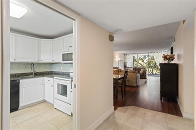 Beautiful, spacious residence with large, screened patio on Palm-Aire Country Club and Resort - Palms in Florida - for sale on GolfHomes.com, golf home, golf lot