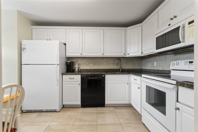 Beautiful, spacious residence with large, screened patio on Palm-Aire Country Club and Resort - Palms in Florida - for sale on GolfHomes.com, golf home, golf lot