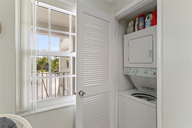 Beautiful, spacious residence with large, screened patio on Palm-Aire Country Club and Resort - Palms in Florida - for sale on GolfHomes.com, golf home, golf lot