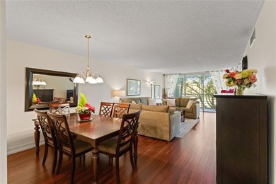 Beautiful, spacious residence with large, screened patio on Palm-Aire Country Club and Resort - Palms in Florida - for sale on GolfHomes.com, golf home, golf lot